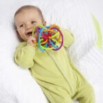 Manhattan Toy Winkel Rattle & Sensory Teether Toy, Blue/Green/Orange, 5 Inch x 4 Inch x 3.5 Inch - Image 3