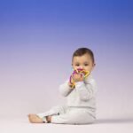 Manhattan Toy Winkel Rattle & Sensory Teether Toy, Blue/Green/Orange, 5 Inch x 4 Inch x 3.5 Inch - Image 5